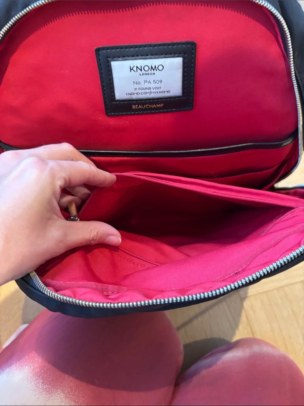 KNOMO Black Nylon Laptop Backpack with Front Zip Pocket